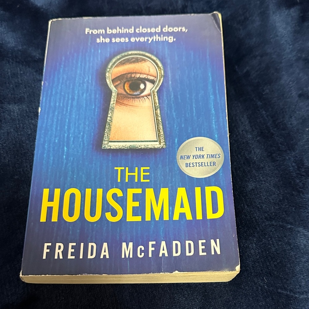 The Housemaid by Freida McFadden - Blue & Yellow Paperback Novel